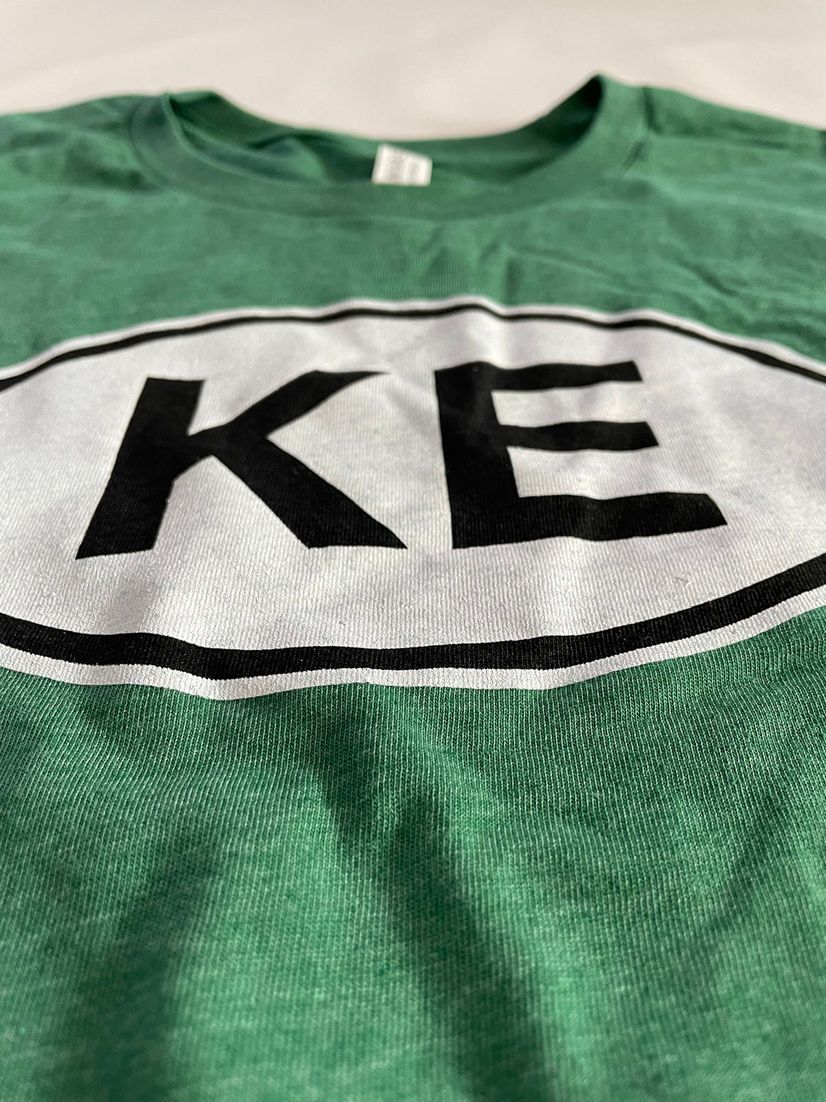 KE oval tee | green